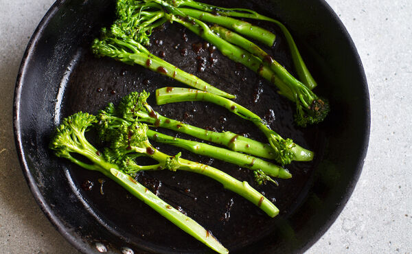 fresh green bimi vegetables on a plate